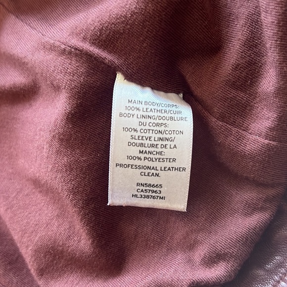 Used in great condition, leather jacket, and burgundy/brown color - Picture 3 of 4